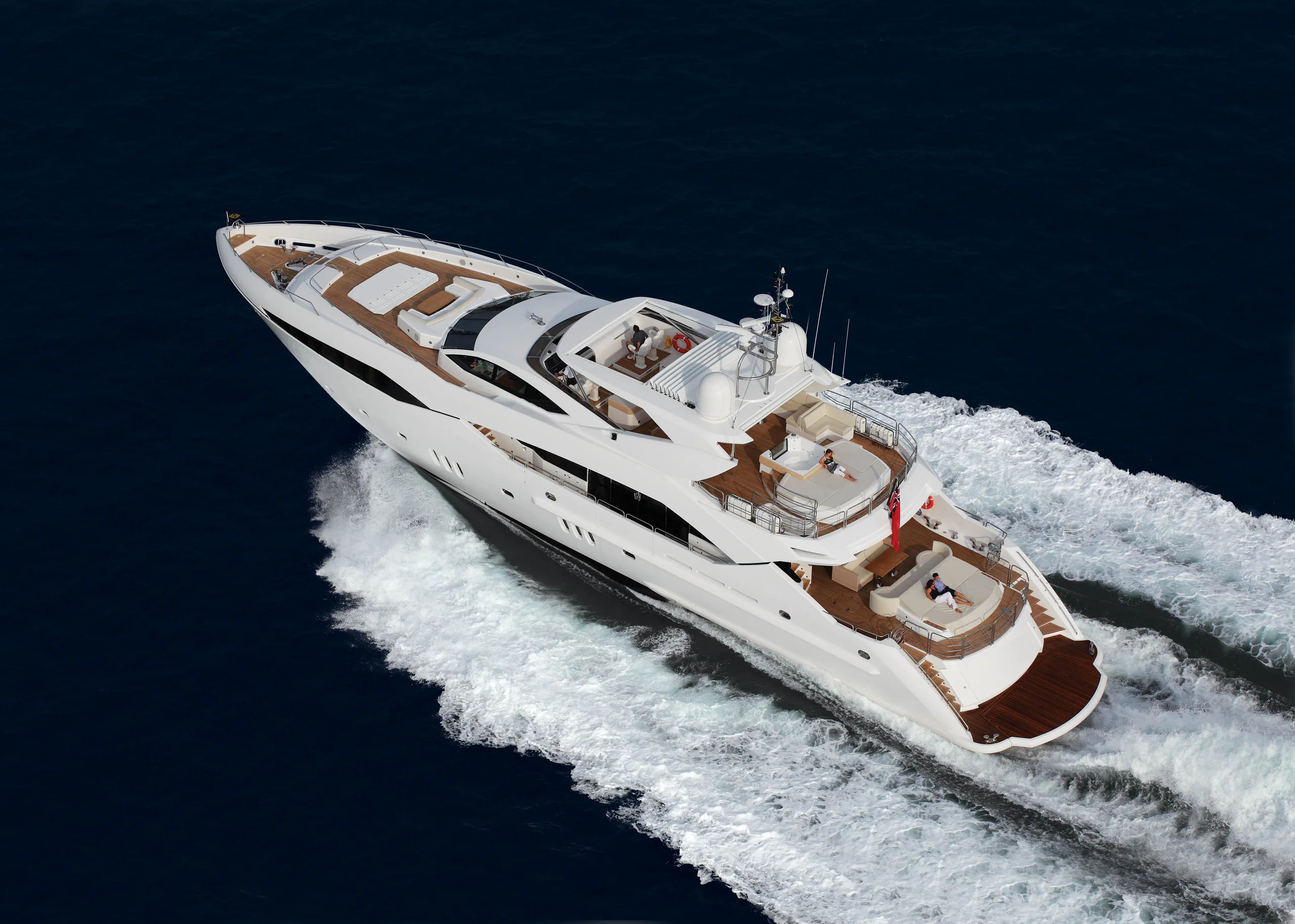 Sunseeker Predator 130 motor yacht at speed on a deep blue sea, seen from above