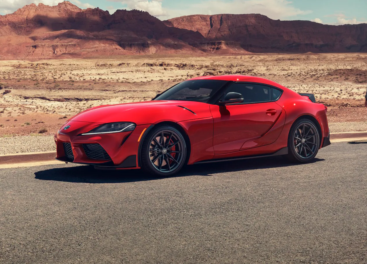 GR Supra in Renaissance Red on a desert road