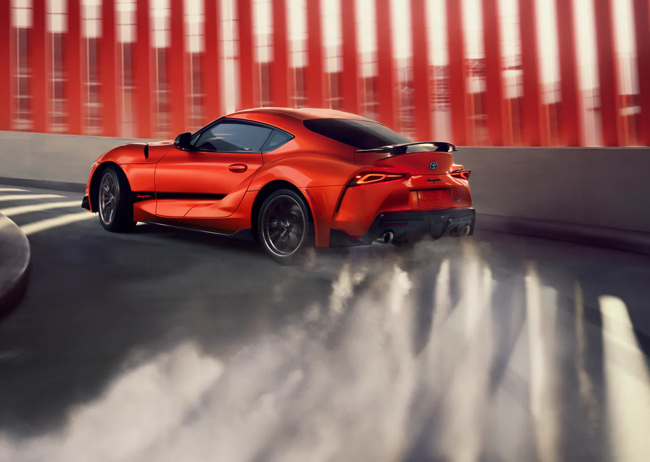 GR Supra drifting through smoke