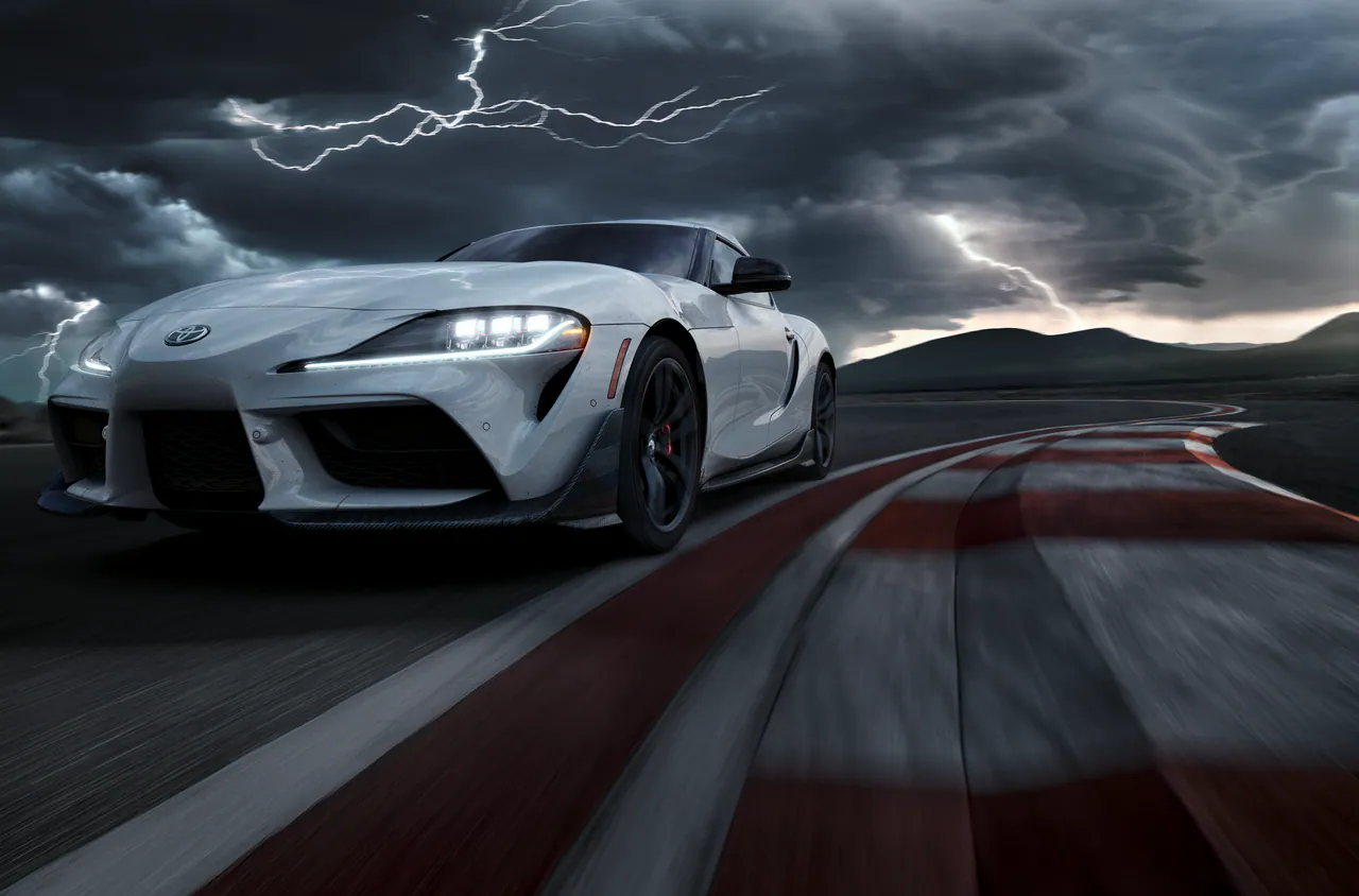 GR Supra on a track under a storm