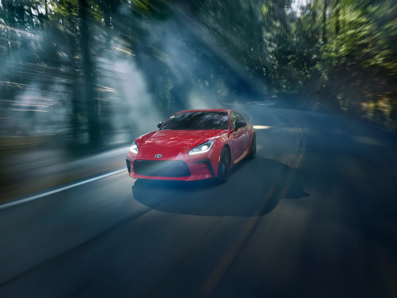 GR86 at speed through the forest