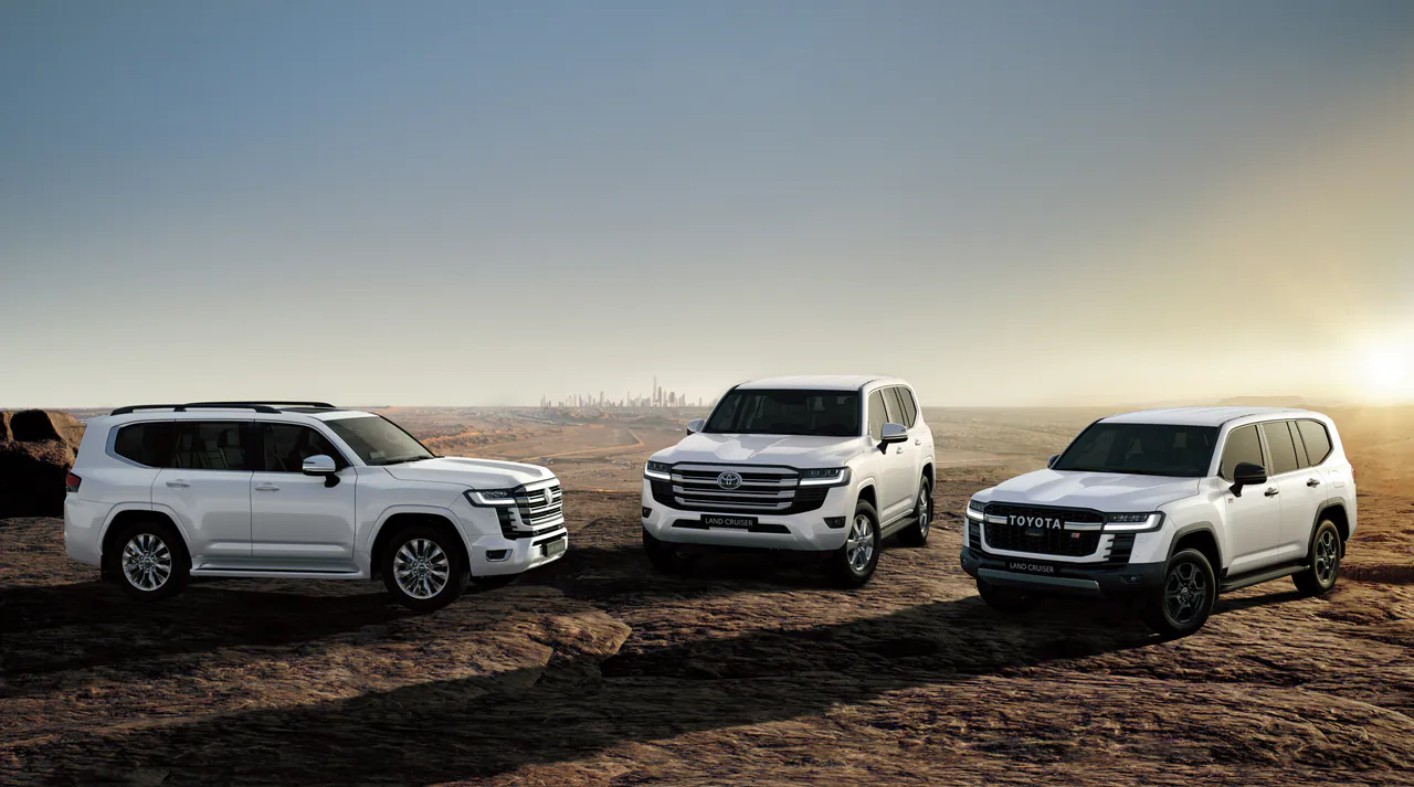 Three Land Cruiser 300s at sunset