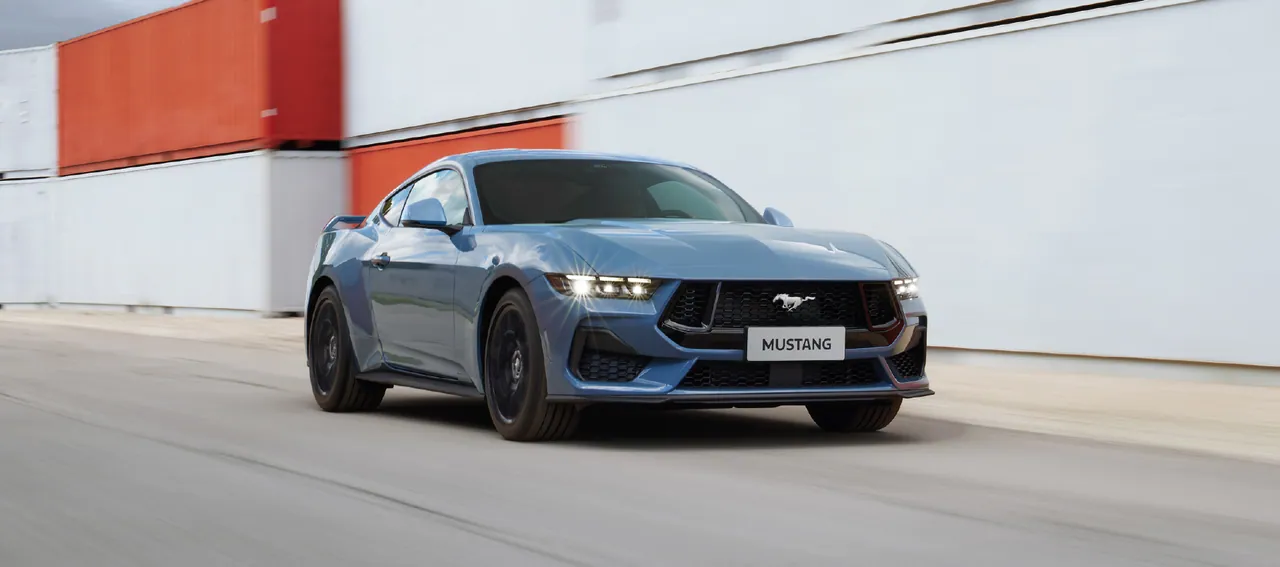 Ford Mustang GT front three-quarter view, LED headlights on