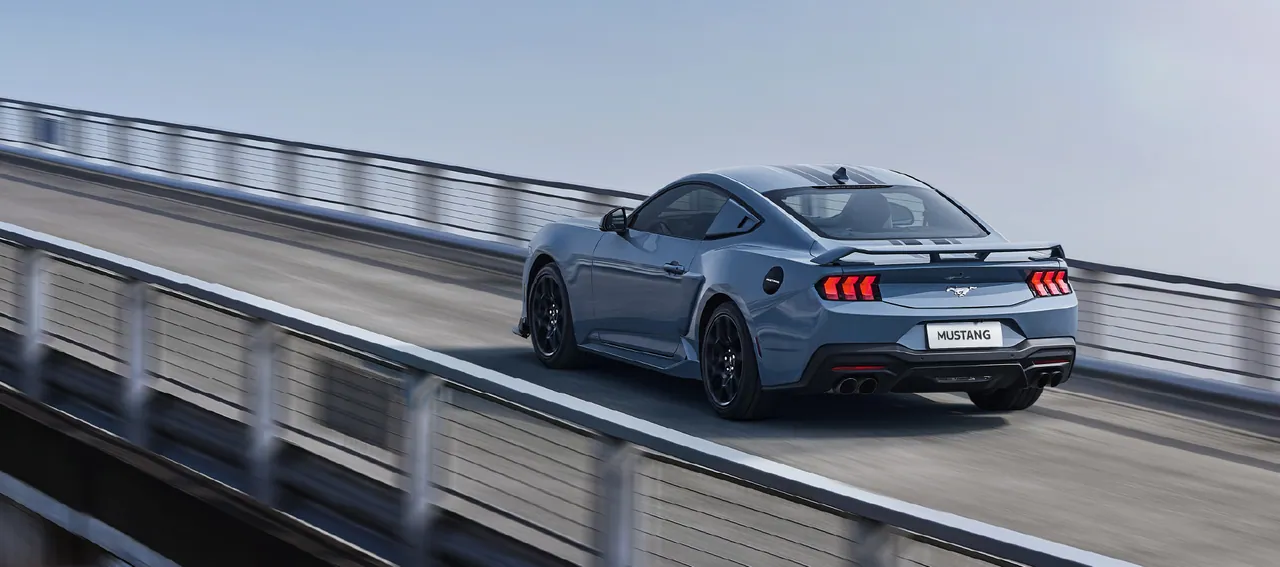 Ford Mustang GT from the rear on a banked track